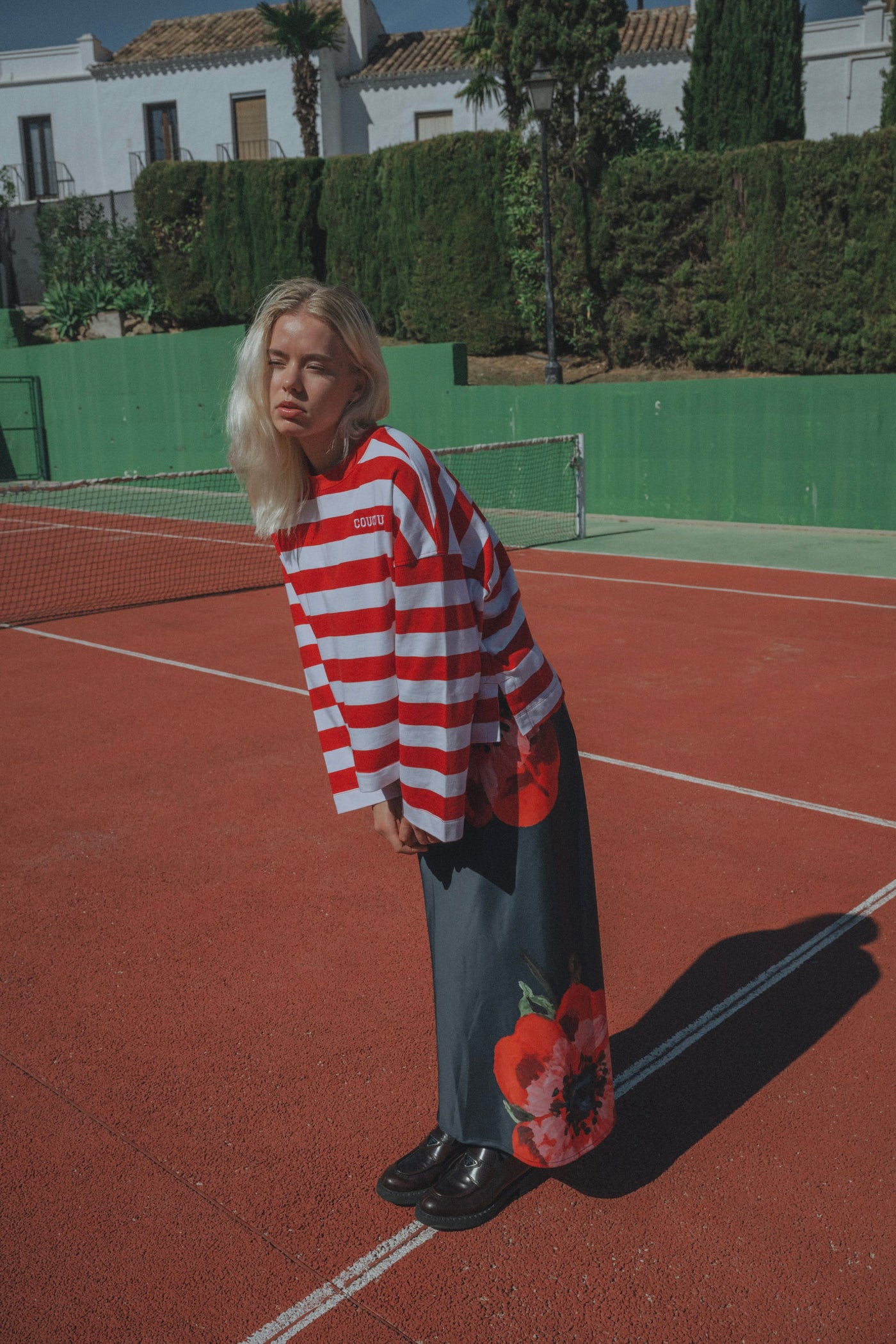 Coucou Sunshine skirt - Navy with poppy print