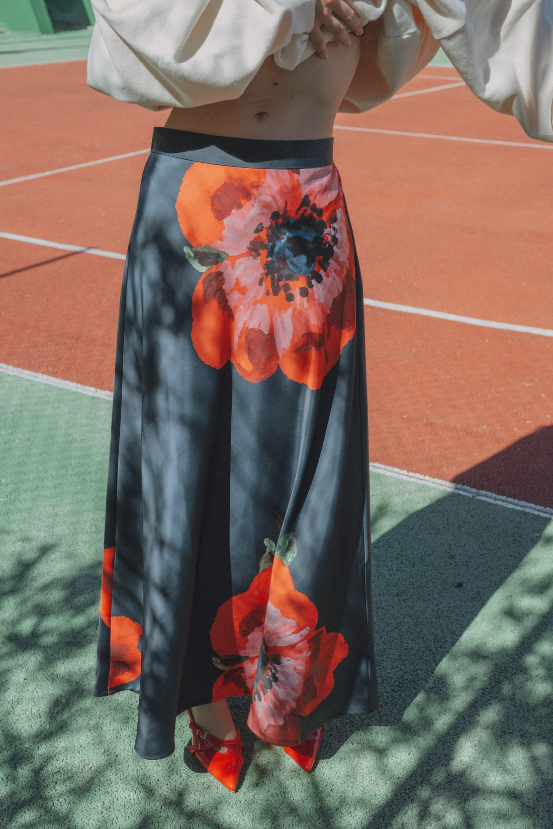 Coucou Sunshine skirt - Navy with poppy print